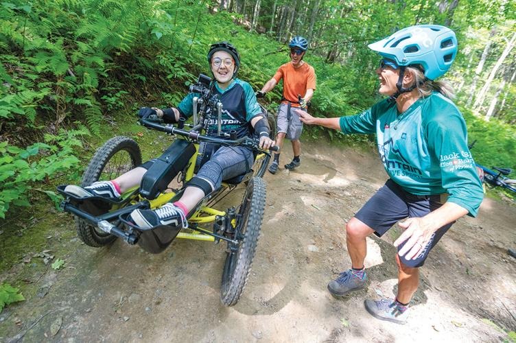 A group of people on a bike.